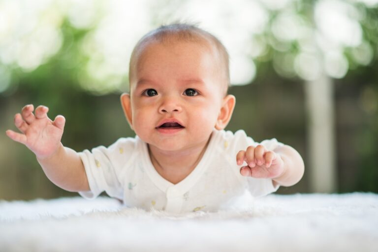 newborn-child-relaxing-on-a-rug-2023-11-27-05-28-30-utc